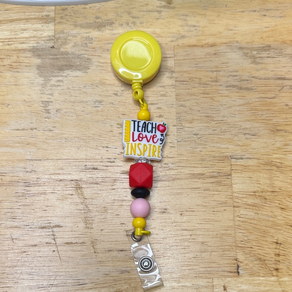 Yellow and Red Teacher Badge Reel